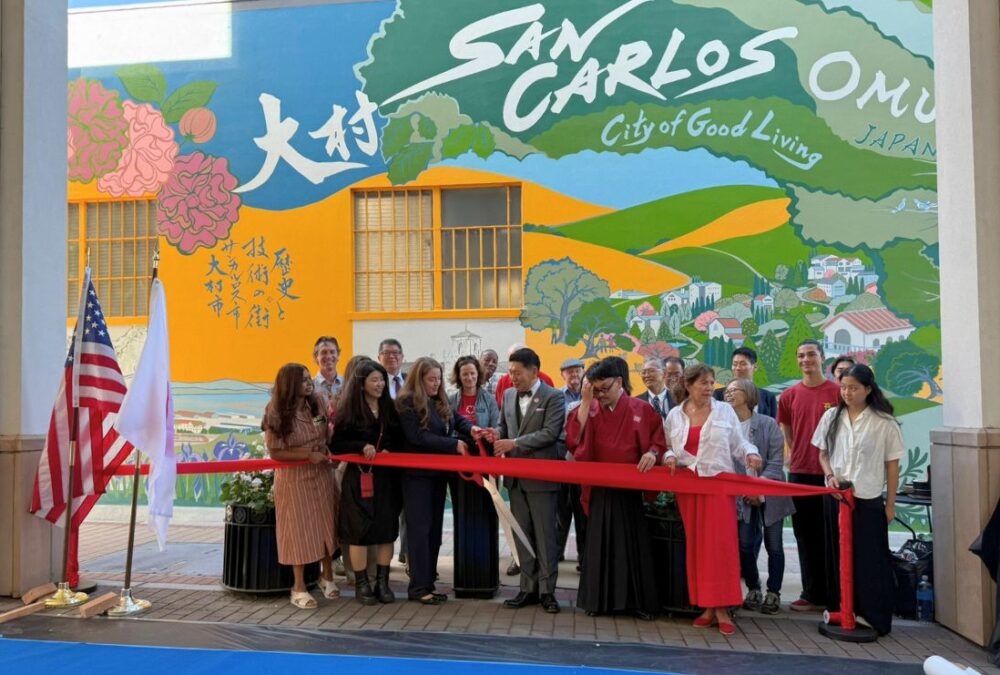 Blossoms Mural Ribbonn Cutting May 2025 Guests Stage